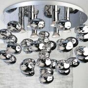 Lampa wisząca Luvia AZzardo AZ2541 wykonana jest z metalu i szkła w kolorze chromu podstawa ma kształt okrągły