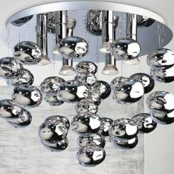 Lampa wisząca Luvia AZzardo AZ2541 wykonana jest z metalu i szkła w kolorze chromu podstawa ma kształt okrągły