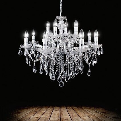 Lampa wisząca Florian SP12 CROMO Ideal Lux  035604 metalowa oprawa w kolorze chromu podstawki z przezroczystego szkła ozdobiony jest zawieszkami z kryształków