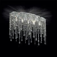 Plafon Rain PL5 Ideal Lux  008455  posiada eliptyczną oprawę wykonaną z chromowanego metalu Klosze tworzą wisiorki  zakończone kryształowymi kroplami