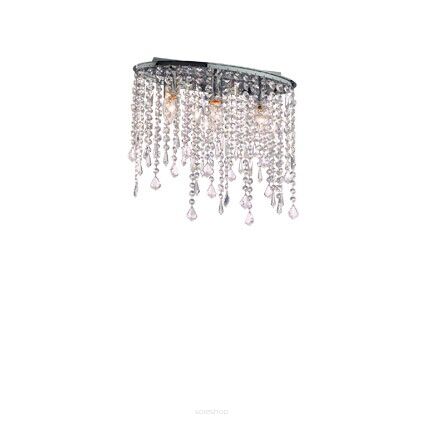Plafon Rain PL3 Ideal Lux  008370  posiada eliptyczną oprawę wykonaną z chromowanego metalu Klosze tworzą wisiorki  zakończone kryształowymi kroplami