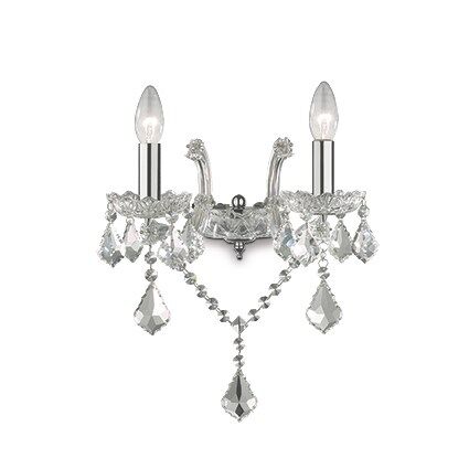 Kinkiet Florian AP2 CROMO Ideal Lux  035642 metalowa oprawa w kolorze chromu podstawki z przezroczystego szkła ozdobiony jest zawieszkami z kryształków