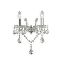 Kinkiet Florian AP2 CROMO Ideal Lux  035642 metalowa oprawa w kolorze chromu podstawki z przezroczystego szkła ozdobiony jest zawieszkami z kryształków